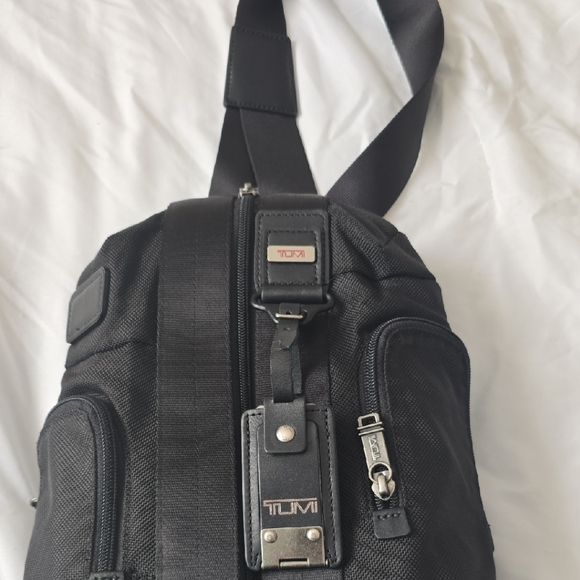 Tumi Black Belt Bag with Sleek Design and Utility